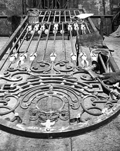 Making of a forged iron door and screen