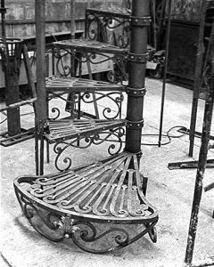 Making of a forged iron door and screenMaking of a forged iron spiral staircase