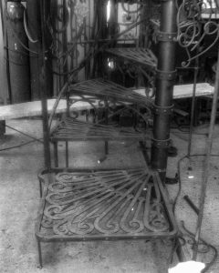 Making of a forged iron door and screenMaking of a forged iron spiral staircase