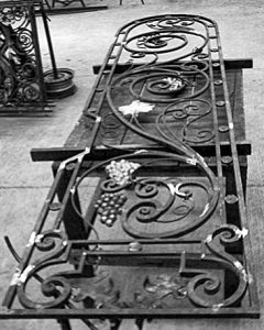 Making of a forged iron door and screenMaking of a forged iron balcony railing