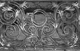 Making of a forged iron door and screenMaking of a forged iron stair railing